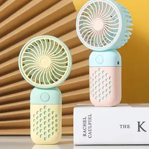 En satıcı renkli Mini taşınabilir el fanı yaz soğutma fanı çocuklar öğrenciler için şarj edilebilir elektrikli telefon fanı