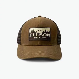 หมวกเบสบอล FILSON รุ่นวินเทจ ผ้าออยล์คลอธ พร้อมปีกหมวกแบบมีช่องระบายอากาศ ป้องกันแสงแดด และดีไซน์ปรับได้ - Product Image 1