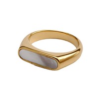 Vente en gros de bijoux en or PVD 18 carats, anneaux en acier inoxydable hypoallergéniques et inaltérables, coquillages blancs et noirs pour femmes et hommes