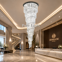 Lustre en cristal personnalisé en spirale rotative pour escalier d'hôtel, lampe suspendue verticale en cascade de cristal de luxe pour hôtel et villa