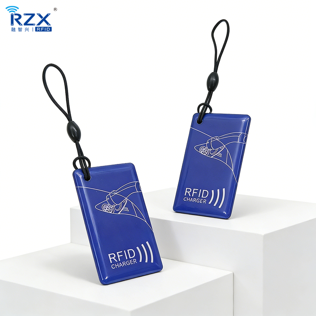 Waterproof PVC+Epoxy NFC RFID Keychain 13.56MHz Customizable Encoding for Motorcycle Charging Station