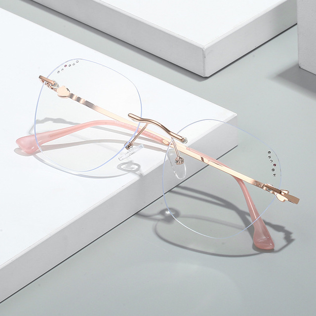 New Rimless Stainless Optical Glasses Metal Rimless Eyewear Oval  Gold Frames for Men Women Wholesale