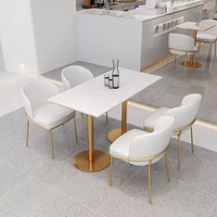Meubles de restaurant modernes de luxe léger, table et chaise en acier inoxydable, canapé, table en marbre, vente en gros pour restaurants américains