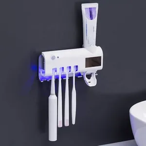 Hot Hot Sell Multi-functional Electric Automatic Toothpaste Dispenser Uv Toothbrush Holder Bathroom Organizer Wall