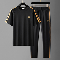 Ensemble deux pièces haut de gamme confortable et absorbant la transpiration pour homme, col rond, manches courtes, brodé