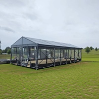Tente de réception panoramique transparente sur mesure avec structure en aluminium noir pour événements en plein air