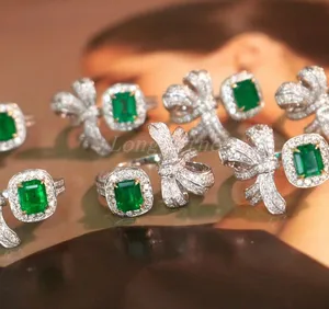 Bowknot Shape In Diamonds With Emerald Openning Ring