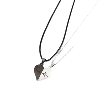 Collier pendentif cœur tendance en alliage de zinc pour couples, cadeau pour les amoureux, nouveau modèle 2025, attirant les cœurs