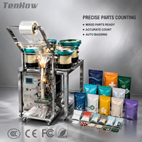 Machine de comptage et d'emballage industrielle de comprimés et de capsules à quatre têtes en acier inoxydable de haute précision pour sachets de portions