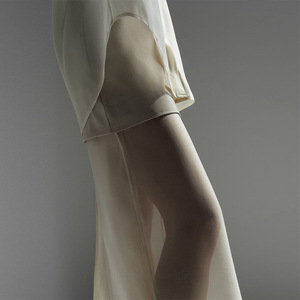 Ensemble 2 pièces tendance pour femme : Nouvelle chemise à manches longues en maille mercerisée à revers et jupe mi-longue à taille haute avec empiècements - Product Image 4