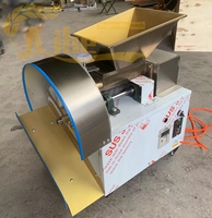 Machine automatique de division et de façonnage de boulettes de pâte pour la production de pains vapeur en boulangerie