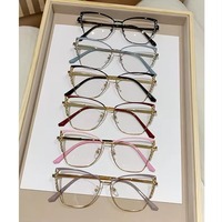 Nouvelle mode Anti-lumière bleue cadre en métal oeil de chat lecture lunettes optiques incrusté de diamant photochromique changement de couleur pour les femmes