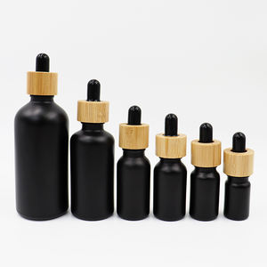 Botella de Vidrio Esmerilado Negro Ámbar de 1oz con Gotero de Madera, Botella Vacía para Aceite Esencial - Product Image 3