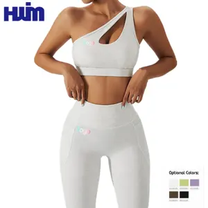 Fabbrica OEM/ODM femminile palestra Fitness Yoga Outfit una spalla Sexy reggiseno sportivo Scrunch Butt sollevamento Leggings set di allenamento per le donne