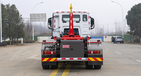 Camions compacteurs électriques Howo à crochet élévateur, camions à ordures amovibles, stations de collecte mobiles, vente directe usine, prix bas