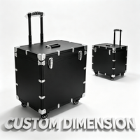 Valise de transport professionnelle noire en aluminium sur roulettes avec poignée télescopique, couvercle alvéolé et insert en EVA