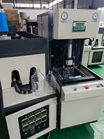 Machine de soufflage de bouteilles en plastique PE/PET semi-automatique 4-6L avec PLC et composants pour bouteilles de gallon