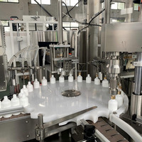 Ligne de production de remplissage de liquides pour flacons compte-gouttes cosmétiques 2026 pour huiles essentielles, huiles capillaires, huiles à barbe, dissolvants de vernis à ongles