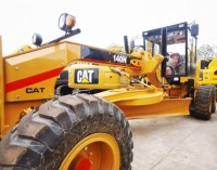 Remise 2023 – Niveleuse sur pneus CAT140H d'occasion de marque japonaise, moteur et pompe d'origine, puissance élevée, fonctionnement efficace, garantie un an
