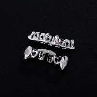 Nouvelles grilles dentaires Hip Hop couleur argent et or, crocs de vampire irréguliers, dents flamboyantes, pour fête d'Halloween, cadeau, bijoux corporels