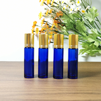 Vente en gros de flacons en verre ronds bleus vides de 10 ml pour huiles essentielles avec bille roulante en métal