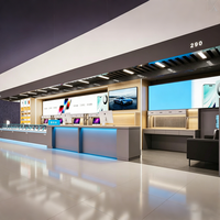 Comptoir d'éclairage LED d'usine, destiné à la présentation de smartphones, d'accessoires et de produits numériques.