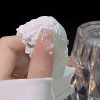 Faux ongles à presser forme cercueil moyenne, 24 pièces, avec base rose nude, French manucure pailletée, fleur 3D, nœud et perle, en ABS, pour filles