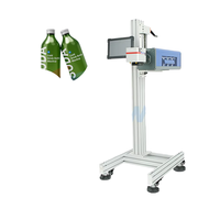 Machine d'impression laser automatique de code de date volant au CO2 électrique pour cartons en papier, bouteilles en plastique - Prix de vente en gros d'usine
