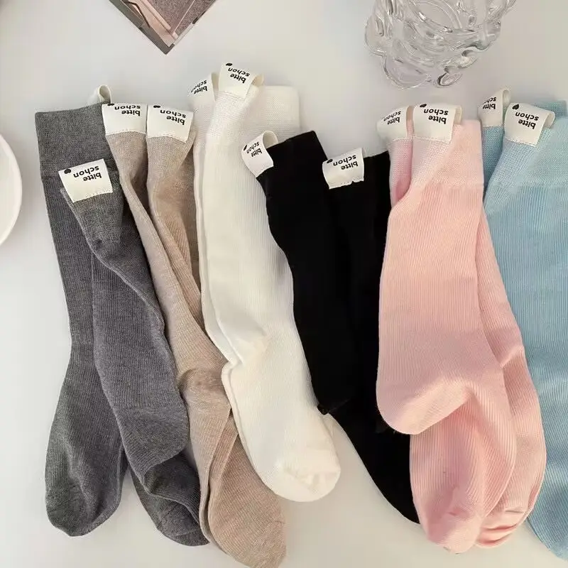 Printemps Tendance Talon Lettres Étiquettes Tissées Filles Bas Doux Coton Respirant Mode Femmes Slouch Chaussettes