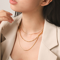 Collier à trois couches en acier inoxydable plaqué or 18 carats, best-seller, collier ras du cou superposé tendance et à la mode pour femmes
