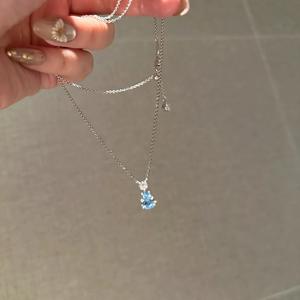 สร้อยคอเงินแท้ S925 ดีไซน์หรูหรา ประดับด้วยพลอยแซฟไฟร์ทรงรีสีขาวทอง พร้อมจี้รูปไข่นกพิราบ - Product Image 5