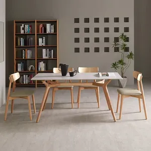 エレガントなデザインの創造的なトンボタイプ無垢材の脚純白マットプレートレジャーダイニングテーブル