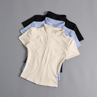 Haut de sport court zippé à col montant, manches courtes, ultra-extensible, sensation seconde peau, séchage rapide, coupe ajustée, pour yoga, entraînement, course et fitness