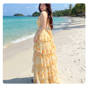 เดรสยาวลายดอกไม้สีเหลืองสไตล์ลำลองสำหรับฤดูร้อน ขายส่ง เดรสชีฟองทรงสวิงแบบผูกคอ ไร้แขน สำหรับผู้หญิง สวมใส่สบายๆ - Product Image 1