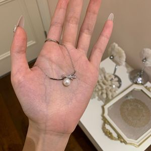 สร้อยคอเงินแท้ S925 ลายดอกคามิลเลีย พร้อมสายคล้องคอแบบดอกไม้ ดีไซน์หรูหรา หวานละมุน ประดับมุก ดีไซน์เฉพาะตัว - Product Image 2