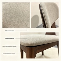 Chaise de salle à manger simple et moderne de style nordique en bois massif, avec rembourrage en coton et lin épais, design sans accoudoirs pour une utilisation polyvalente dans les salles à manger