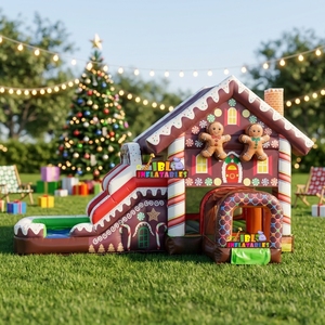 Château gonflable de Noël en PVC en forme de maison de pain d'épices avec toboggan, idéal pour les fêtes d'enfants et la location commerciale - Product Image 1