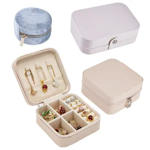 FADELI-caja de almacenamiento de joyas para mujeres y niñas, organizador portátil con cierre de tuerca para las orejas, de cuero PU, cajas pequeñas de joyería de viaje, gran oferta