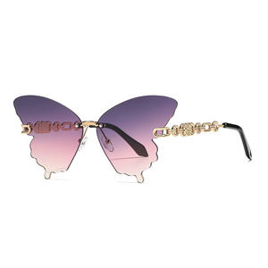 Gafas de sol con forma de mariposa para mujer, montura metálica, lentes degradadas, protección UV400, estilo callejero moderno, montura grande - Product Image 1