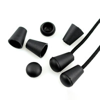Ajusteur de cordon en plastique noir de forme elliptique avec texture rainurée pour le serrage de cordes et de sangles