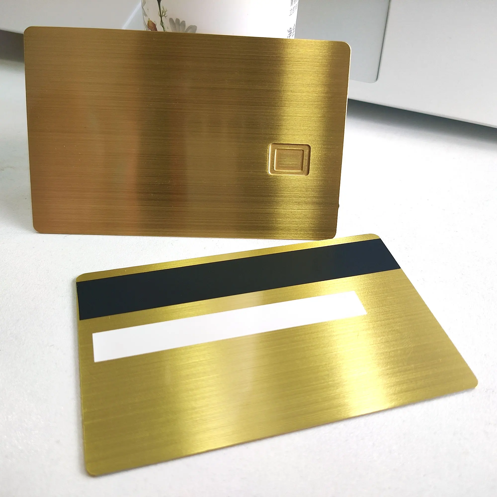 bank metal visa credit card with chip slot and magnetic stripe and signature panel