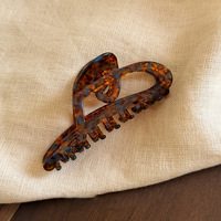 Pince à cheveux minimaliste française en acétate, motif cœur évidé, texture écaille de tortue classique, pince crabe polyvalente pour femme