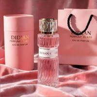 Vente en gros d'usine, flacon de parfum en verre transparent avec étiquette personnalisée, 100 ml, 50 ml, flacon en verre vide avec boîte en tube de papier et sac pour femmes
