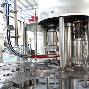 Máy đóng chai, chiết rót, đóng nắp, kết hợp nhiều chức năng (12000-36000 chai/giờ) dùng cho nước đóng chai, nước trái cây, nước có ga, cà phê, sữa, dầu. - Product Image 6