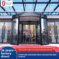 Porte tournante moderne à deux ailes en verre pour supermarchés et bâtiments d'entreprise avec commande manuelle et design de colonne annulaire en verre intelligent