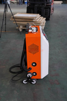 Machine de nettoyage au laser pulsé refroidie par air portable de 1000 W pour la rouille des métaux, la peinture, l'huile, le revêtement et le nettoyage des surfaces