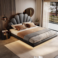 2024 lit flottant minimaliste italien en cuir véritable Double couche supérieure pétale de peau de vache cadre en bois moderne pour chambre principale