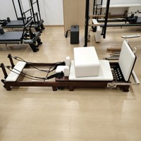 Lit de Pilates en bois de noyer chinois de haute qualité, directement de l'usine, portable et pliable pour usage au bureau, disponible en gros