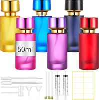Vente en gros de flacons vaporisateurs de parfum de voyage vides, ronds, noirs, polyvalents, de 50 ml, rechargeables, pour les distributeurs professionnels