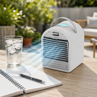 Mini Raffrescatore d'Aria Elettrico Portatile da Tavolo con Serbatoio d'Acqua da 700ml, Design con Cubetti di Ghiaccio, Umidificatore DC per Hotel e Casa